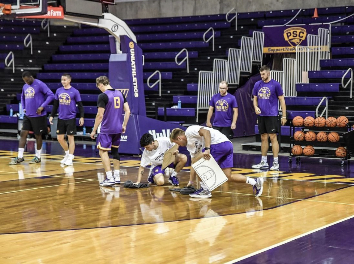 Student managers help with drills during practice as well as assisting
players with individual workouts to help sharpen their skills.