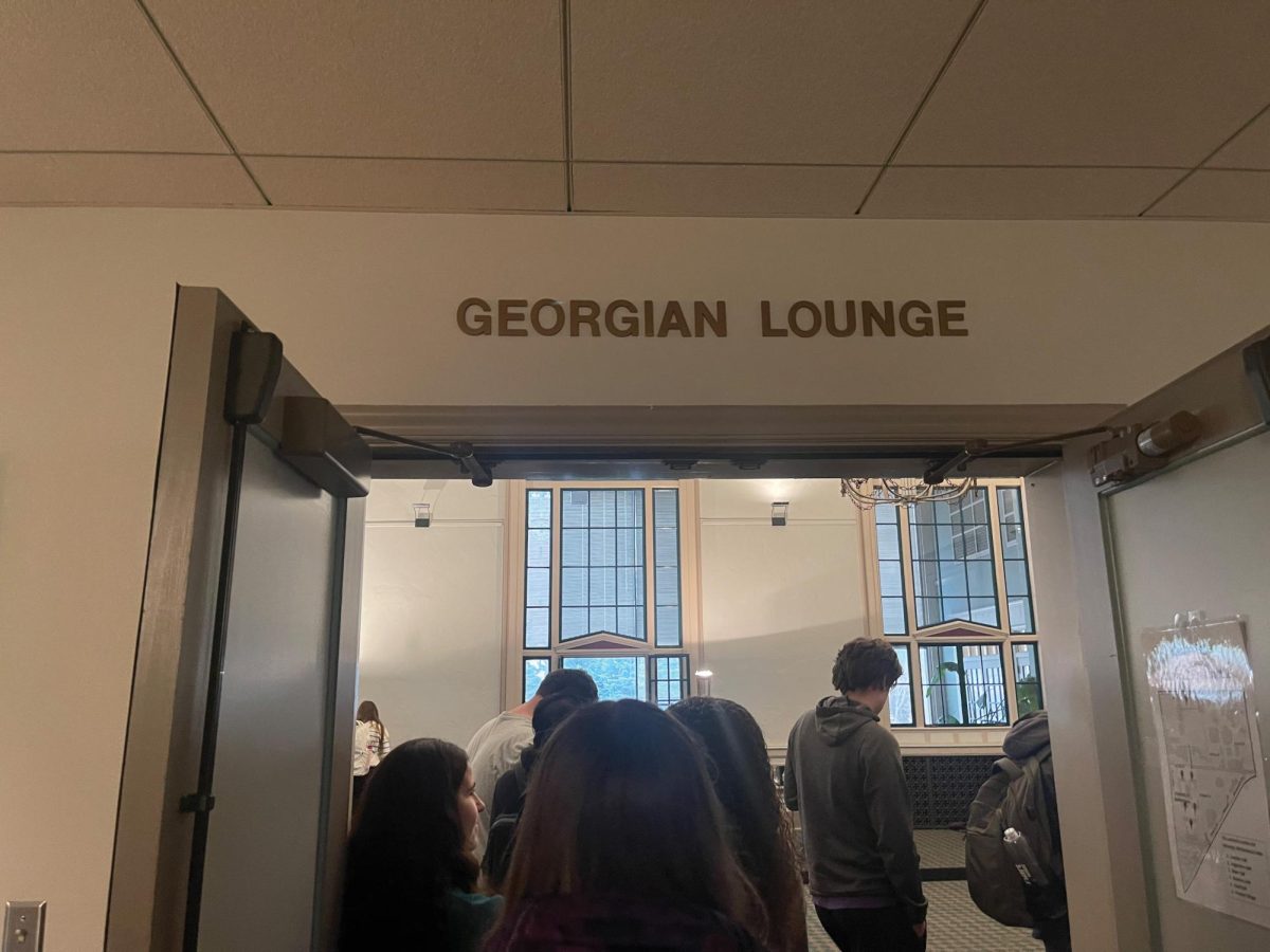 After the collapse of the Commons Ballroom ceiling, the voting location was changed to the Georgian Lounge. Many of these students registered to vote today, as Iowa is one of a handful of states that allows same-day registration.