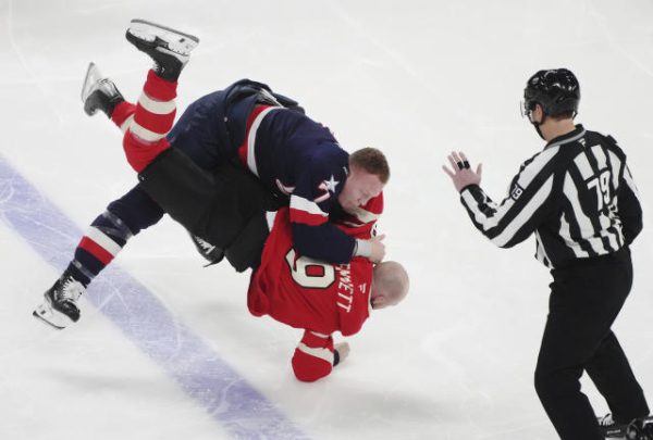 Players of the U.S.A. team went after the Canadian players after the United States National Anthem was booed.